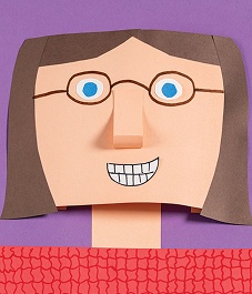 Colorful paper craft face with glasses and big smile on purple background.